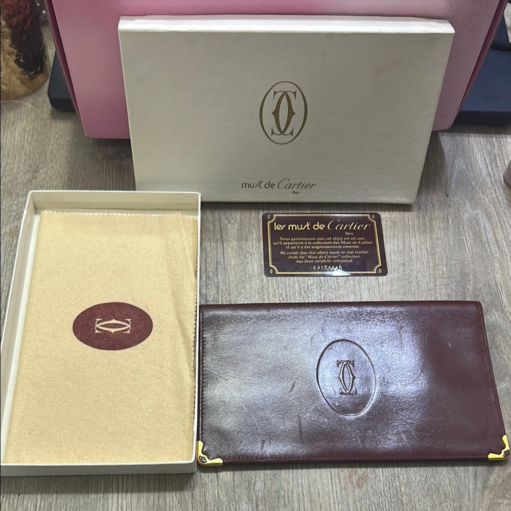 Cartier Maroon Leather Wallet with Gold Accents - Must De Cartier